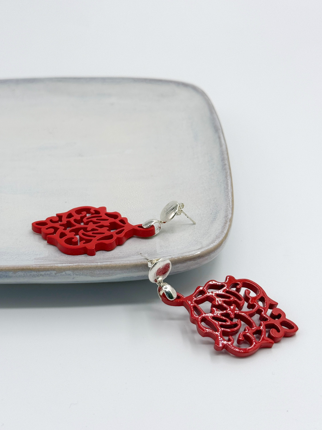 Horn Ohrring Charm Red